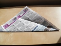 newspaper first fold unfolded
